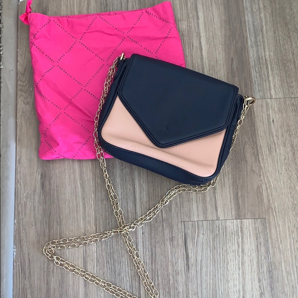 Cute never worn Navy and blush Cornelia Guest